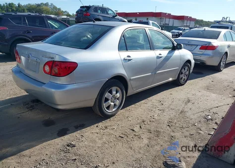 2005 Toyota Corolla Le z USA, uszkodzony, nr VIN 2T1BR30E85C444185